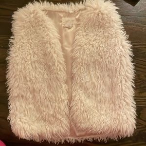 a white furry vest very warm!